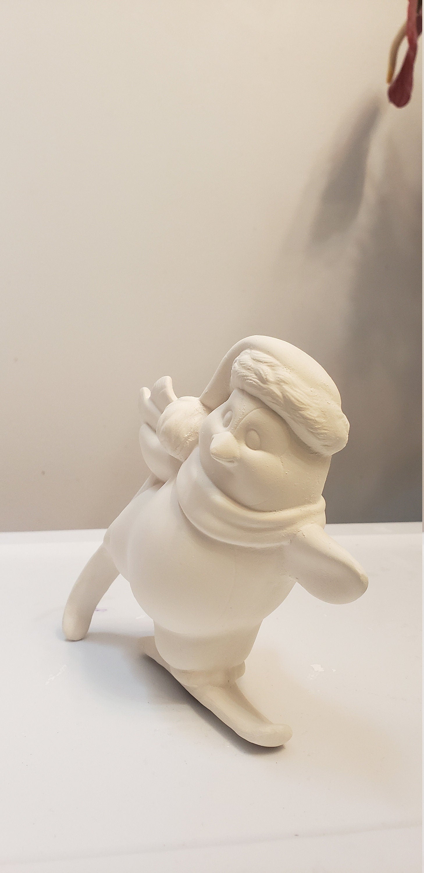 Penguin skiing bisque/Christmas decor bisque