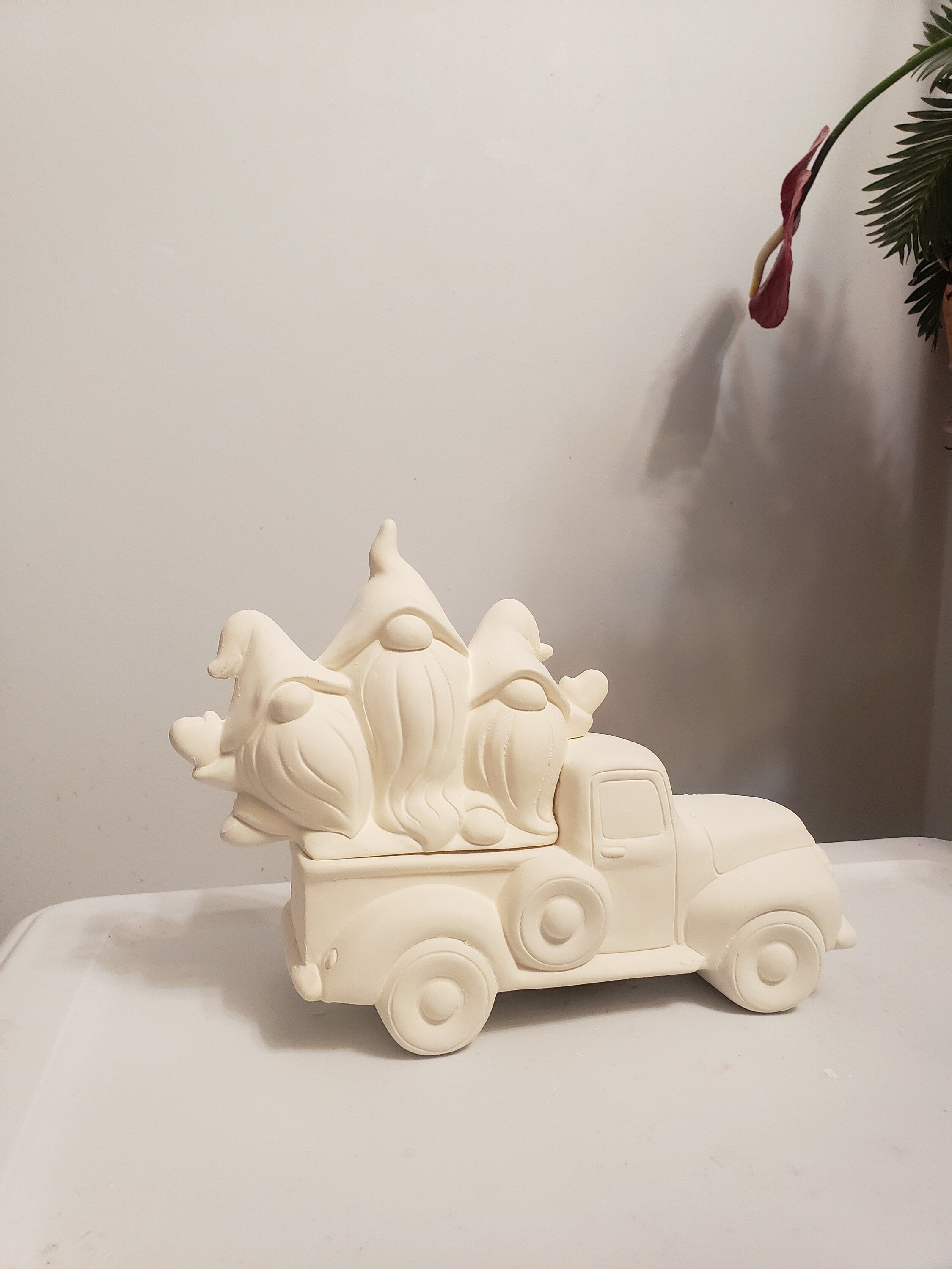 Paint-your-own 3 gnomes on truck