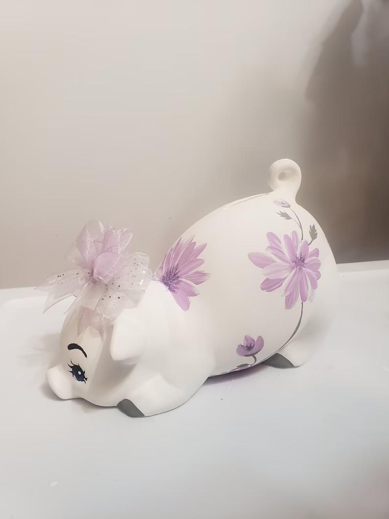 Large white piggy with lilac flowers
